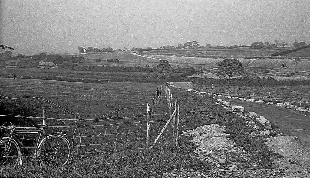 The chaging scene on Bowerham Lane. My bicycle against the fence.